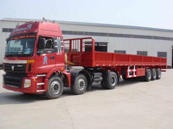 【济宁】2012年7月 二手欧曼双导牵引车订做轻型挂车 红色 手动挡