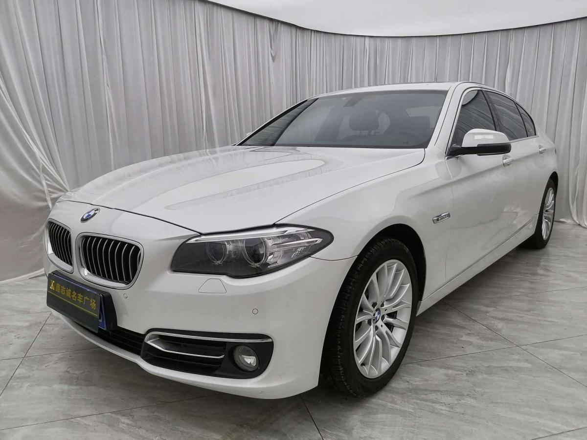 哈尔滨2014年7月宝马宝马5系2014款525li豪华设计套装白色手自一体