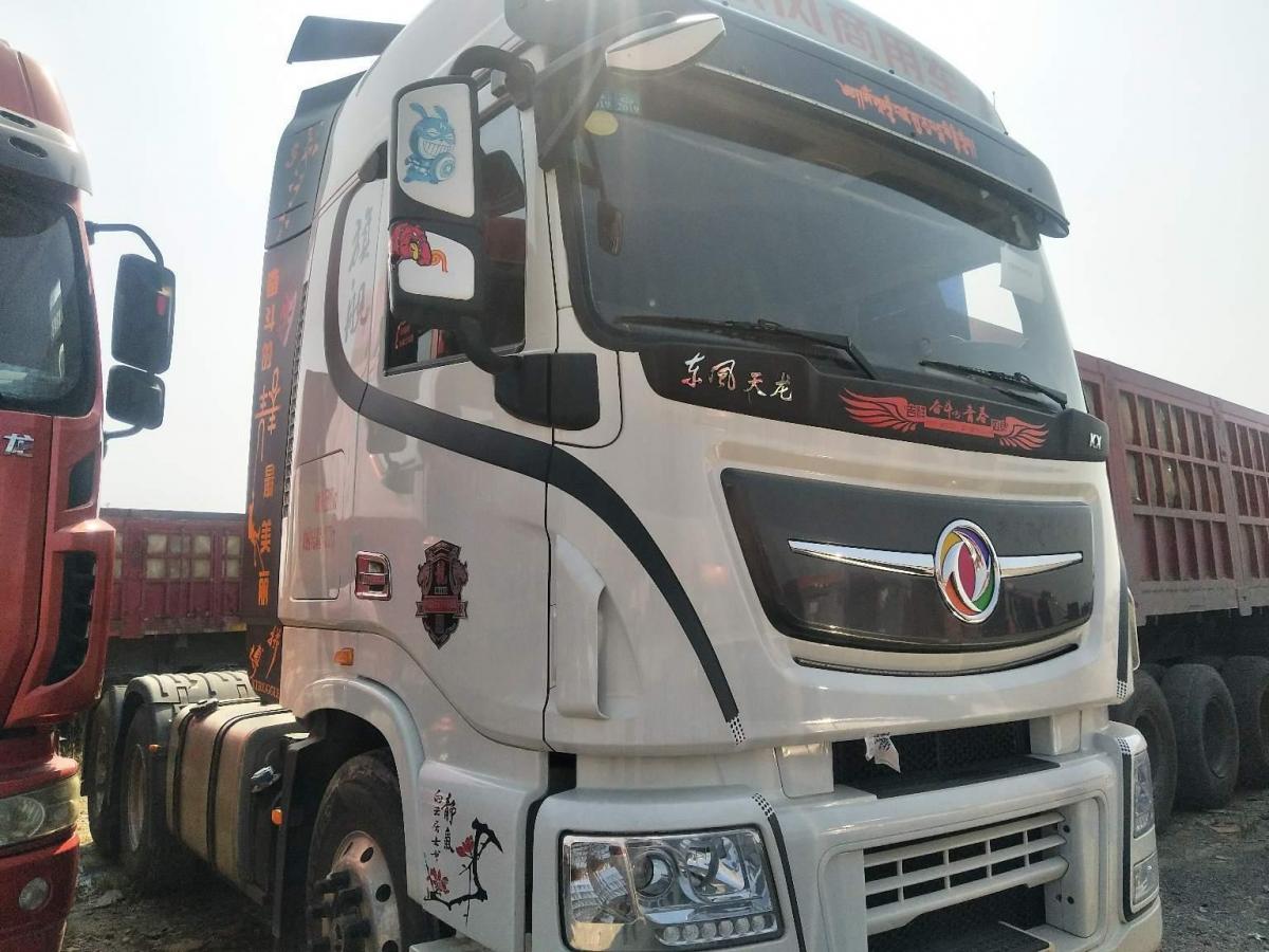 玉林2018年9月东风天龙旗舰版560马力拖头国五排放白色手动挡