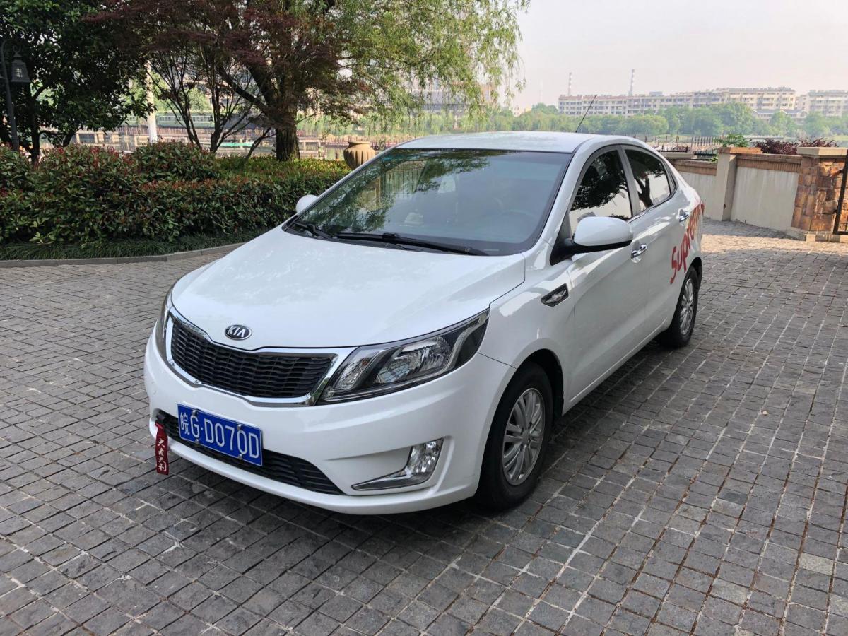 【铜陵】2013年10月 起亚 k2 三厢 1.4l mt gls纪念版 白色 手动挡