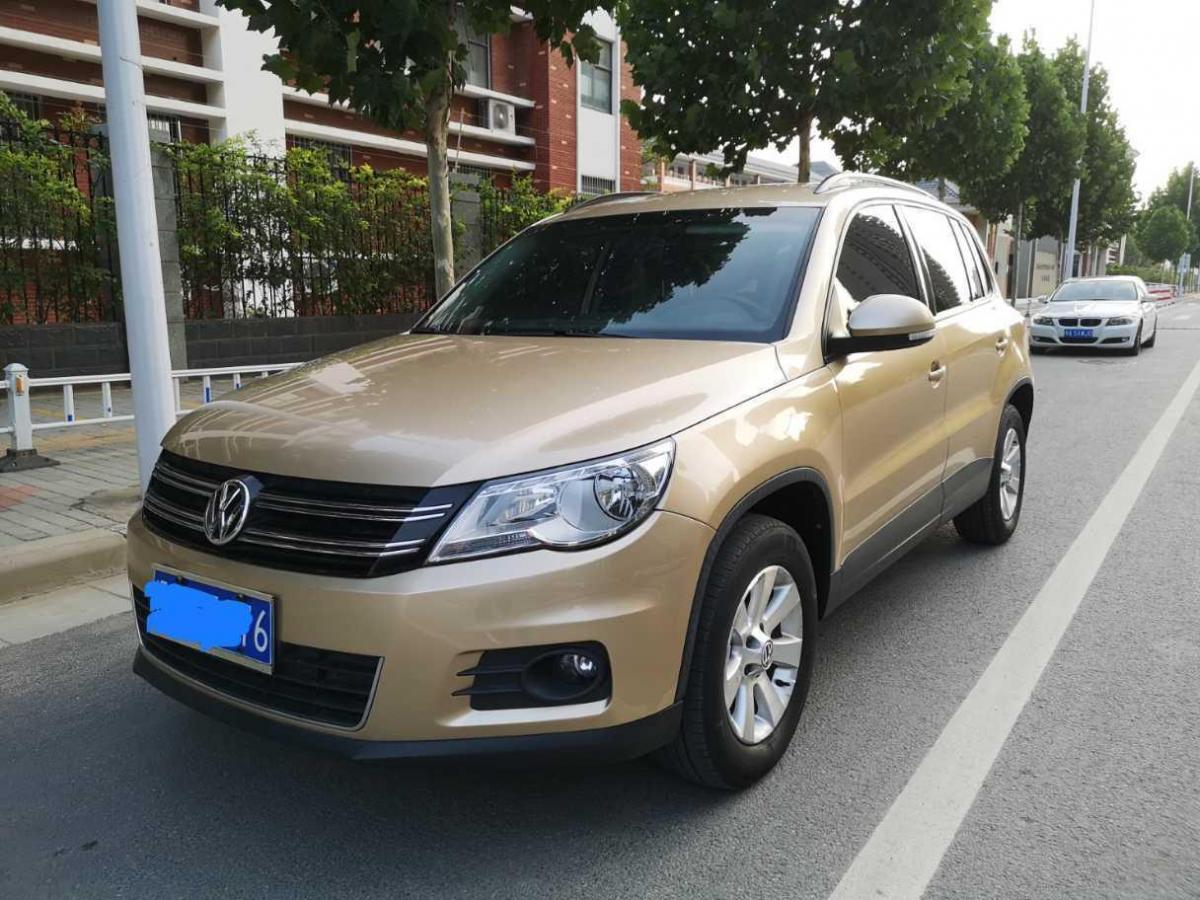 郑州2012年8月大众途观2012款18tsi自动两驱风尚版黄色手自一体