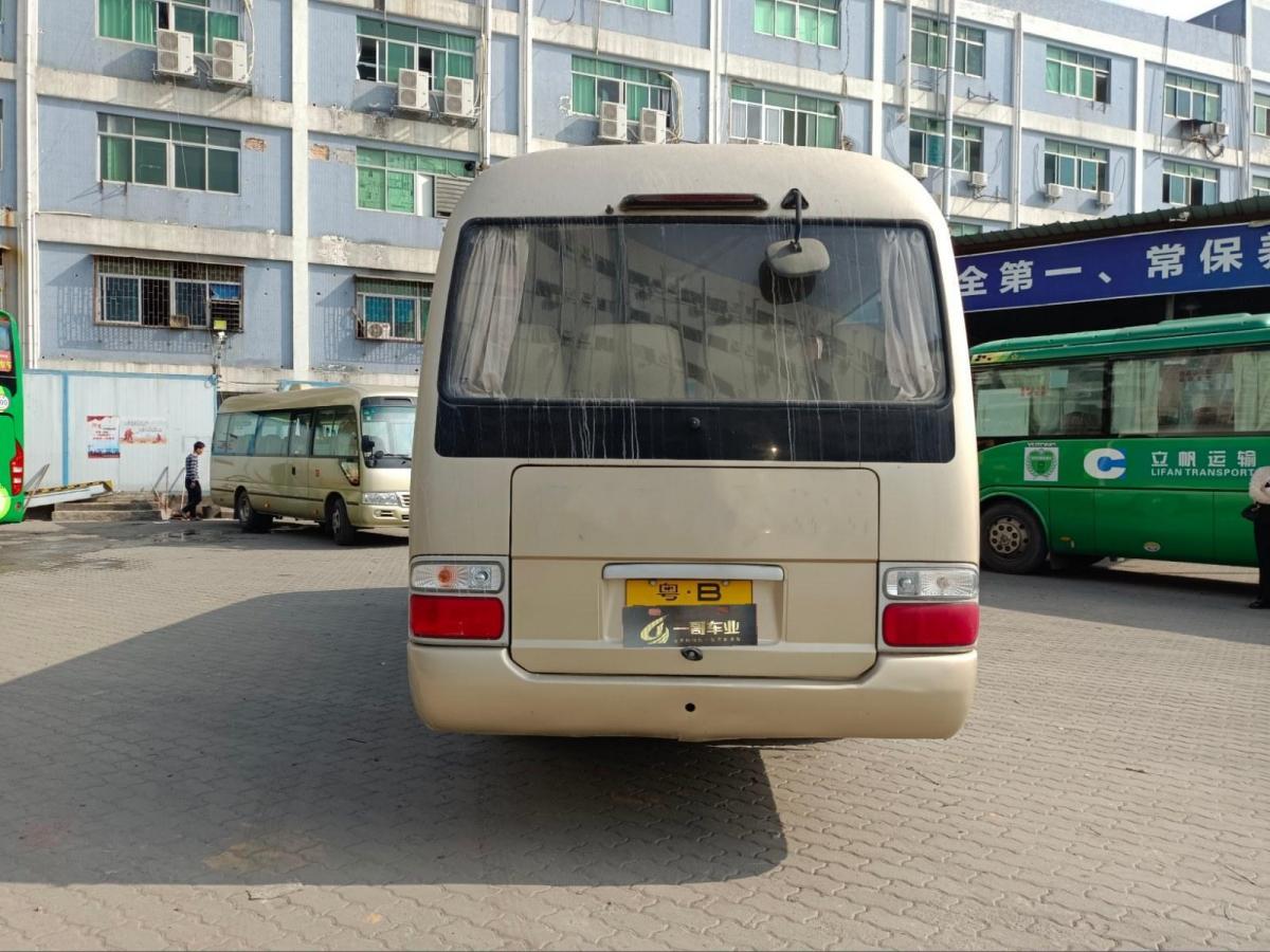 27座封边玻璃外摆门国四江铃6702型中巴图片